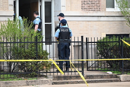 Chicago police department officers enter the building to gather evidence, Friday where a 46-year-old male was shot and killed. 46-year-old male shot and killed in the hallway of a building in Chicago, Illinois, United States on April 12, 2024. At approximately 4:48 p.m., Friday, a 46-year-old male, was found unresponsive in the hallway in a building located on the 5600 block of S. Michigan Avenue with a gunshot wound to the chest. The victim was transported to the hospital where he was pronounced dead. There is no information on any possible suspects.