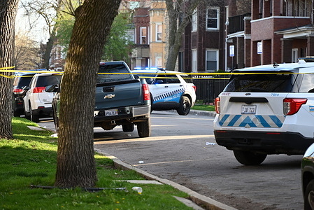 Police block off roads where the shooting took place. Chicago police officers discovered a 22-year-old male victim lying on the street with multiple gunshot wounds to his body in the 7700 block of S. Carpenter at approximately 5:16 pm, Saturday. The victim was transported to The University of Chicago Hospital where he was pronounced dead. No suspects are in custody.