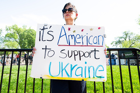 A protester holds a placard in support of Ukraine during a demonstration in front of the White House in Washington.