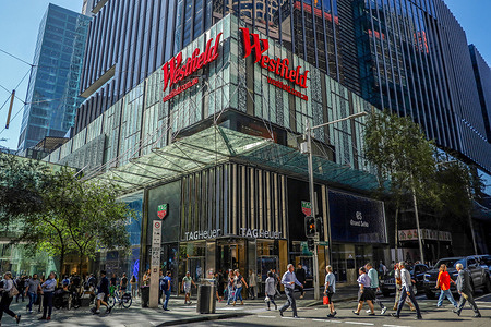 Pedestrians are seen crossing the street in front of the Westfield shopping Mall. Westfield Sydney is Sydney's most convenient shopping destination, located in the heart of the city at Pitt Street Mall.