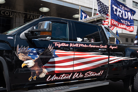 A Pro-Trump truck covered with Trump flags and stickers drives past the NYC courthouses. Trump supporters gathered across from the courthouse where jury selection begins for the trial of former President Donald Trump. Trump faces felony charges related to hush money paid to adult film actress Stormy Daniels. This is the first time in US history any former president will be tried on 
criminal charges.