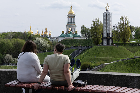 Women have a rest in Vechnoi Slavy Park in central Kyiv.
