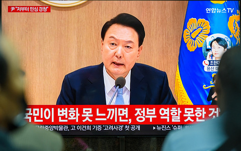 South Korea's 24-hour Yonhapnews TV shows - South Korean President Yoon Suk Yeol speaks during a Cabinet meeting at the presidential office -on a TV at Yongsan Railroad Station in Seoul. South Korean President Yoon Suk Yeol humbly accepted the public sentiment revealed in the parliamentary election and said he would strive to improve communication with the people.