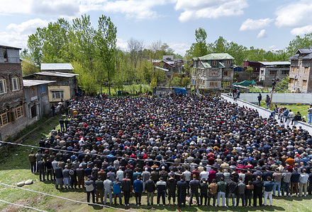 People attend the funeral of five individuals who died after drowning when a boat capsized in Srinagar. A boat ferrying six individuals, including a woman and her two siblings, capsized while crossing the swollen river Jhelum in Srinagar. The boat, carrying at least 15 people, mostly children, resulted in six fatalities, with three individuals still missing. Continuous rainfall for past two days, leading to a rise in water levels in the Jhelum river led to the tragedy.