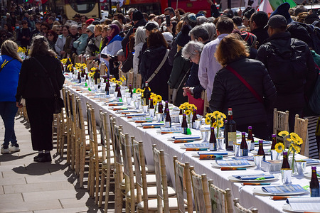Pro-Israel campaigners set up a Passover Seder table opposite Downing Street with 133 empty seats and posters of hostages held by Hamas in Gaza, calling for their release.