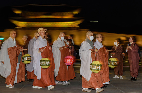 South Korean Buddhist monks are circling the pagoda during a lighting ceremony to celebrate the upcoming Buddha's birthday at Gwanghwamun Square in downtown Seoul. Buddha's Birthday is a Buddhist festival celebrated mostly in South Asia, Southeast Asia, and much of East Asia, marking the birth of Siddhartha Gothama, the prince who became the Gothama Buddha and founded Buddhism. According to Buddhist traditions and archaeologists, the Gothama Buddha was born around 563-483 B.C. in Lumbini, Nepal. In Korea, Buddha's birthday is celebrated according to the Korean lunar calendar and is a national holiday.