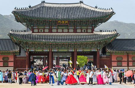 Tourists wearing traditional Korean hanbok are visiting Gyeongbokgung Palace in Seoul. Gyeongbokgung Palace was built three years after the Joseon Dynasty (1392-1910), located north of Gwanghwamun Square, was founded and served as a royal palace. Gyeongbokgung Palace is located in the center of the capital of Korea.