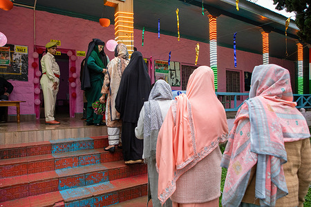 Women voters wait in a queue to cast their votes outside a polling station during the first phase of the Lok Sabha, or lower house, of the Indian parliamentary elections in Banihal, an area in Ramban district of Udhampur parliamentary constituency. The 2024 Lok Sabha or lower house parliamentary polls are the first major election in Jammu and Kashmir since New Delhi stripped Article 370, the region's special semi-autonomous status, in 2019. Voting in India, the worldís largest democracy, will be held in seven phases between April 19 and June 1, 2024. Over 970 million voters, more than 10% of the worldís populatios, will elect 543 members for the lower house of Parliament for a term of five years.