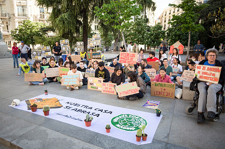 Protesters hold placards during a protest in front of the Spanish Congress of Deputies in Madrid, demanding more results to confront the climate crisis. Young activists from the "Youth for Climate" movement called for an action within the Global Climate Action Day promoted internationally by Fridays For Future.