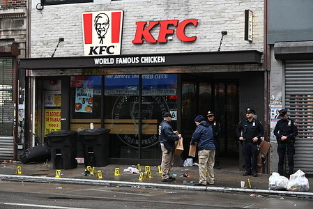 Police officers seen at the crime scene investigate the officers involved in the shooting. Man killed by police after holding a knife during a dispute with a woman on Roosevelt Avenue in Queens, New York, United States on April 20, 2024. At approximately 4:07 a.m., two NYPD police officers became aware of a dispute in the intersection of 103 Street and Roosevelt Avenue, walked over and observed a male with a knife in a dispute with a woman, officers attempted to tease the suspect and when the taser did not work, officers shot and killed the suspect.