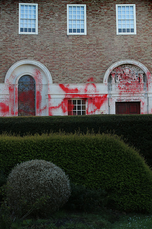 Red paint coats the walls and front door of County Hall viewed across their ornate gardens after a nighttime attack from Palestine Action. Activists from Palestine Action leave the exterior of the County Hall building covered in red paint and graffiti after the nighttime attack. This is the third action in the space of a month. The protesters demand that Somerset Council terminate the lease on office space they let to Elbit Systems in Aztec West, Bristol. They argue that weapons made by Elbit Systems in the UK are being used by the Israel Defence Force against Palestinians in Gaza and elsewhere. Israeli bombing in Gaza has killed over 30,000 Palestinians since October 2023.