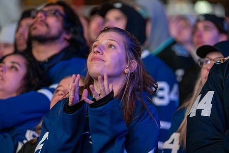 Fans gather at Maple Leaf Square outside Scotibank Arena, watching Toronto Maple Leafs vs Boston Bruins playoff game on a giant screen.
Final Score: Boston Bruins 2: 3 Toronto Maple Leafs During Toronto Maple Leafs playoff games, Maple Leaf Square transforms into a sea of blue and white, echoing with the chants of passionate fans eagerly rallying behind their team's quest for victory. The electric atmosphere radiates anticipation and excitement, creating unforgettable memories for both die-hard supporters and casual observers alike.