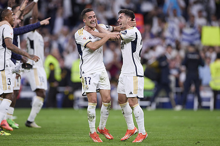 Lucas Vazquez (L) of Real Madrid CF and Brahim Diaz (R) of Real Madrid CF celebrate the victory against FC Barcelona at the end of the 2023/2024 La Liga EA Sports week 32 football match between Real Madrid CF and FC Barcelona at Santiago Bernabeu stadium. Final score: Real Madrid CF 3:2 FC Barcelona.