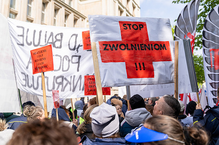 Protesters hold a banner that says "Stop layoffs" during the demonstration. Hundreds of people gathered in front of the Ministry of State Assets to protest against low wages in the Polish Post Office and massive layoffs in this sector.