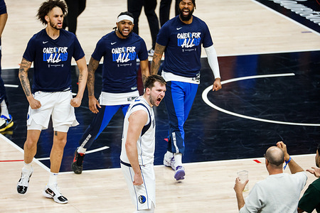 Dallas Mavericks' Luka Doncic (C) reacts after scoring against the Los Angeles Clippers during an NBA basketball playoffs round one game 2 at Crypto.com Arena. Final score: Mavericks 96:93 Clippers