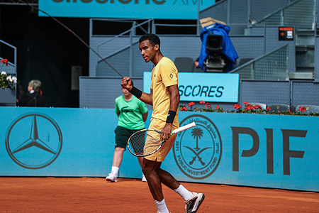 Felix Auger-Aliassime of Canada plays against Yoshihito Nishioka of Japan (Not in view) on Day Four of the Mutua Madrid Open 2024 tournament at La Caja Magica. Felix Won 2-1