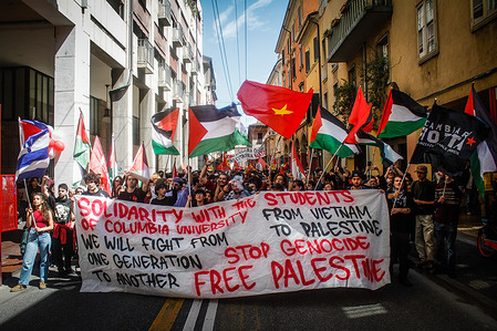 Protesters hold a banner and flags during the demonstration to mark the 81st anniversary of the Liberation Day. Anniversary of the Liberation of Italy, Bolognia commemorates the end of the Second World War, and the end of the Nazi occupation of the country.