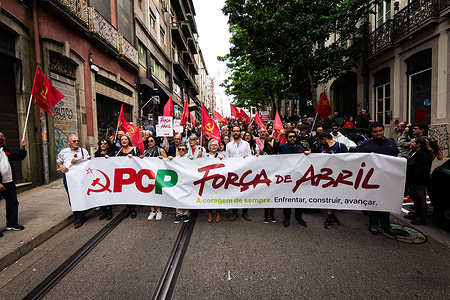 Militants of the Portuguese Communist Party seen with a placard that says "April Force", during the parade that marks the 50th anniversary of the Carnation Revolution. Thousands of people joined the celebrations of the 50th anniversary of the 25th of April in Porto. On April 25, 1974, a military revolution, known as the Carnation Revolution, ended the dictatorship of the Estado Novo, restoring democracy in Portugal. Since then this day has been celebrated as Freedom Day.