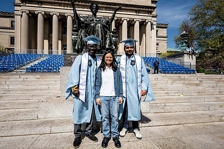 Students dressed in cap and gown (in preparation for Commencement) at Columbia University in New York City.