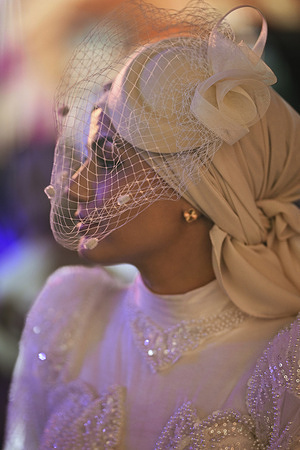 A lady wearing a bridal vest seen among the public. On the second day of the Istanbul Modest Fashion Week 2024, the Turkish brand Terzi Dukkani and Serpil, the Palestinian Sineen Haute Couture, the American Citizens of the World, the Nigerian Africa Abaya, and Bangladesh Niharika Momtaz presented their collections in the parade show of Istanbul Modest Fashion Week 2024 in Fisekhane Gallery, Istanbul.