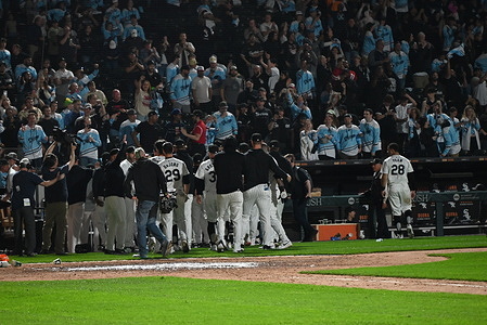 Chicago White Sox celebrate their win on the field after Andrew Benintendi #23, professional baseball outfielder for the Chicago White Sox batted a two-run walk-off home run in extra innings during the Major League Baseball game matchup between the Tampa Bay Rays and Chicago White Sox at Guaranteed Rate Field. For the first time all season, the Chicago White Sox have won two games in a row. Final score; Tampa Bay Rays 7 : 8 Chicago White Sox.