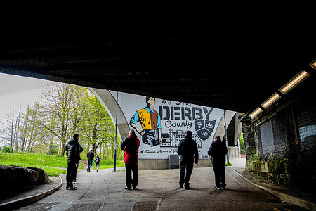A mural saying 'We Are Derby' organised by Popside Fanatics seen before the Sky Bet League One match between Derby County and Carlisle United at Pride Park Stadium.