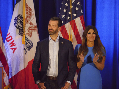 Members of United States President Donald J. Trump's family including, left to right, Donald Trump Jr, Trump Junior's girlfriend, Kim Guilfoyle attend the Keep Iowa Great press conference in Des Moines.