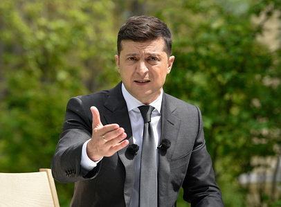 President of Ukraine, Vladimir Zelensky speaks during a press conference on the first anniversary of his tenure in the garden of the Mariinsky Palace.