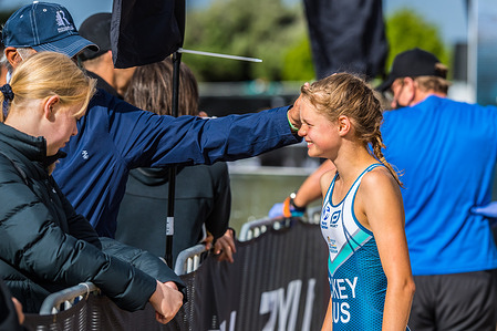 Family of the Youth category triathlete, Abbey Hickey seen congratulating her during the 2XU Triathlon Series 2021, Race 1 at St Kilda Beach.