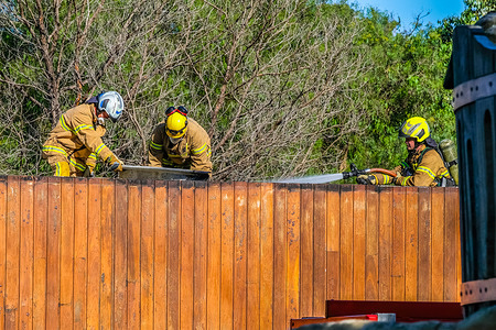 Firefighters are seen on the roof of the burnt utility building in Alma park using a fire hose to put out the fire.
A fire broke down early morning on Thursday 18th February. According to the officers at the scene the cause of the fire is under investigation. Investigators are looking at 3 scenarios: deliberately lit arson, electrical fault or accidental man-made fire - cigarette in trash. No casualties have been reported.