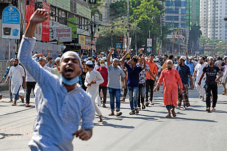 Muslims chant slogans during the demonstration.Muslims Protest Over Demeaning Of The Holy Quran In Dhaka, Bangladesh. Protests began on October 13 after a footage emerged of a Koran being placed on the knee of a figure of a Hindu god during the celebrations for the Hindu festival of Durga Puja.