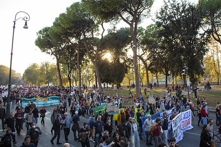 Protesters hold banners while marching on the street during the demonstration.
Climate activists from 'Fridays for Future' held a protest against the G20 of World Leaders Summit in Rome.