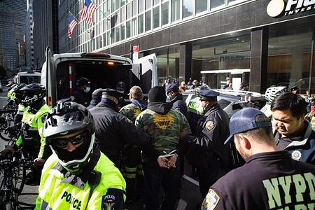 NYPD seen arresting protesters and putting them into van, during the demonstration.
Six protesters were arrested at the BlackRock Headquarters after hundreds of protesters with the United Mine Workers of America (UMWA) called on a strike to stop the company from harassing union members and provide a fair contract to workers.