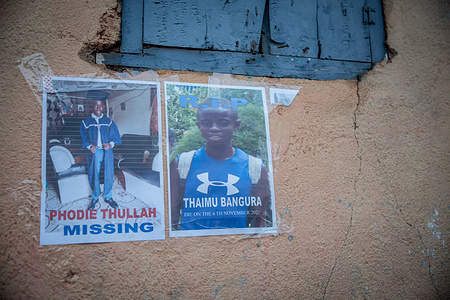 Posters with pictures for missing and dead people seen at the site of the fuel tanker explosion in Wellington. More than 100 people died after a fuel tanker caught fire in eastern Freetown on the night of November 5, 2021.