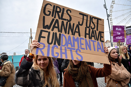 Protesters hold a placard expressing their opinion during the demonstration.Protesters took to the streets of France protesting violence against women.
