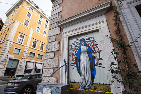 The Virgin Mary “Mother” is seen drawn on a wall, as the latest work by street artist Harry Grab made in Rome downtown on occasion of the annual Feast of the Immaculate Conception.