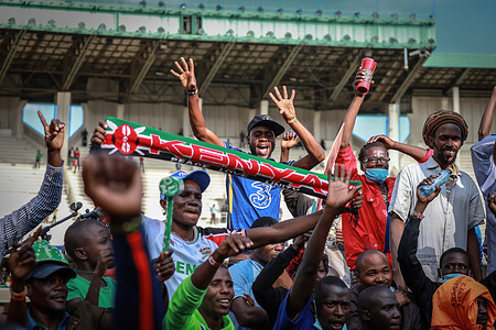 Kenyans chant slogans during the Azimio la Umoja convention at Kasarani Stadium in Nairobi.Thousands of supporters of Orange Democratic Movement (ODM) leader Raila Odinga gathered at Kasarani National Stadium in Nairobi to attend Raila Odingaís Azimio la Umoja Convention where the leader was expected to formally declare his 2022 presidential bid.