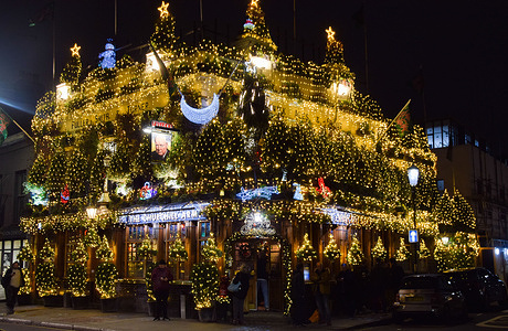Christmas decorations are seen at the Churchill Arms. 
80 trees and thousands of lights adorn the exterior of the famous pub in Kensington.