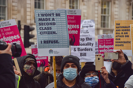 A protester holds a placard which says 'I won't Be Made A Second Class Citizen' during the demonstration.
Demonstrators gathered outside Downing Street in protest against the Nationality and Borders Bill, which could potentially strip up to 6 million British people of their citizenship.