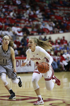 Indiana Hoosiers guard Nicole Cardano-Hillary (4) in action against Western Michigan Broncos guard Megan Wagner (11) during an NCAA women's basketball game at Assembly Hall in Bloomington.
(IU beat Western Michigan 67-57)