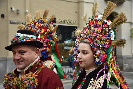 Ukrainians seen with decorated hats during a parade.
Ukrainian believers celebrate the Orthodox Christmas Day according to the old Julian calendar on 07 January.