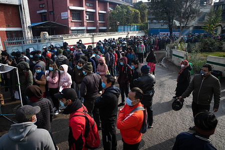 People lineup to receive a COVID-19 vaccine at Sukraraj Tropical and Infectious Disease Hospital.
Nepal government has decided to make 'vaccination cards' the proof of COVID-19 inoculation, mandatory for entry into public spaces such as government offices, hotels, cinema halls, among other places from January 17.