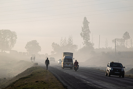 Pedestrians and vehicles are seen on a road covered with smog emanating from a nearby Giotto dumpsite.
An electricity post is seen in an area covered with smog from a nearby Giotto dumpsite.
Open burning of garbage in Nakuru has become a common occurrence. This activity produces fumes and smoke that are harmful to the environment because the materials release toxic chemicals that pollute the air. Studies show that air pollution would cause diseases and climate change.