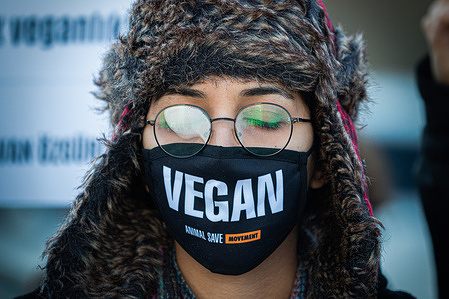 A protester wearing a face mask that says "Vegan" is seen during the demonstration at the Ministry of Agriculture and Forestry headquarters.
The Animal protection law stating "Animals are not Commodities" was implemented in July 2021. The last day of the sterilization of dangerous dog breeds was on January 14. Animal lovers opposed to the move gathered outside the Ministry of Agriculture and Forestry in Ankara.