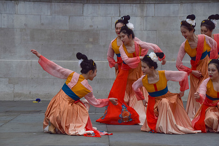 Members of the University College London (UCL ) Chinese Student Society stage a dance performance outside the National Gallery at Trafalgar Square.